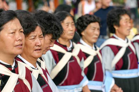 The Naxi people in traditional attire, Lijiang, China